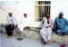 4 amigos outside of mosque - Old Town Zanzibar